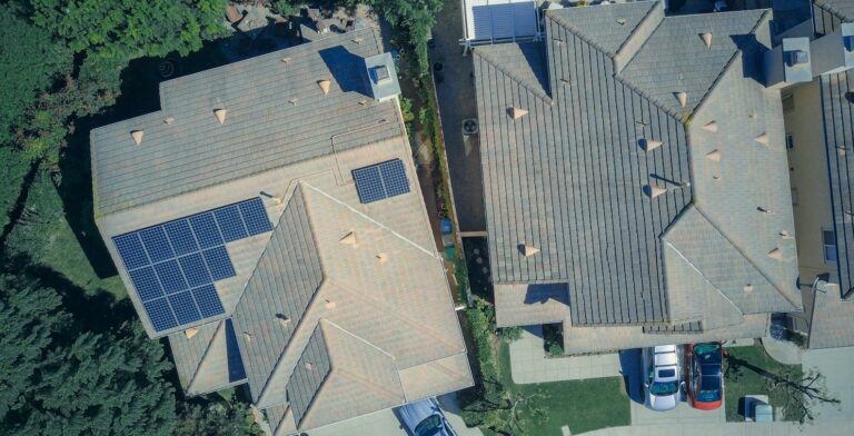 Aerial View of Two Houses with Roof Tiles