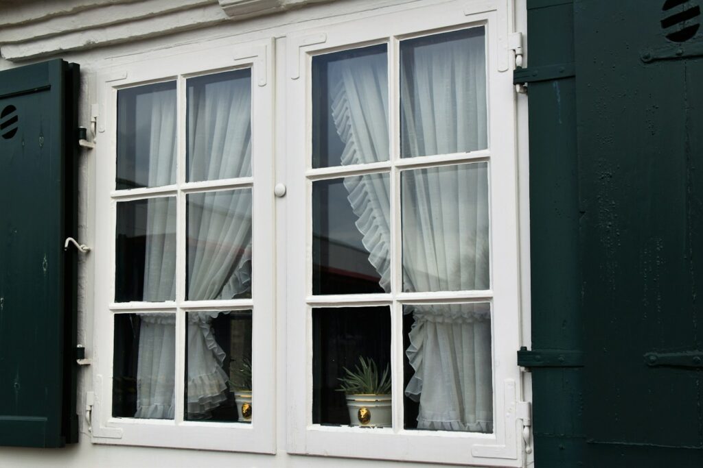 white wooden framed glass window czyste powietrze wymiana okien